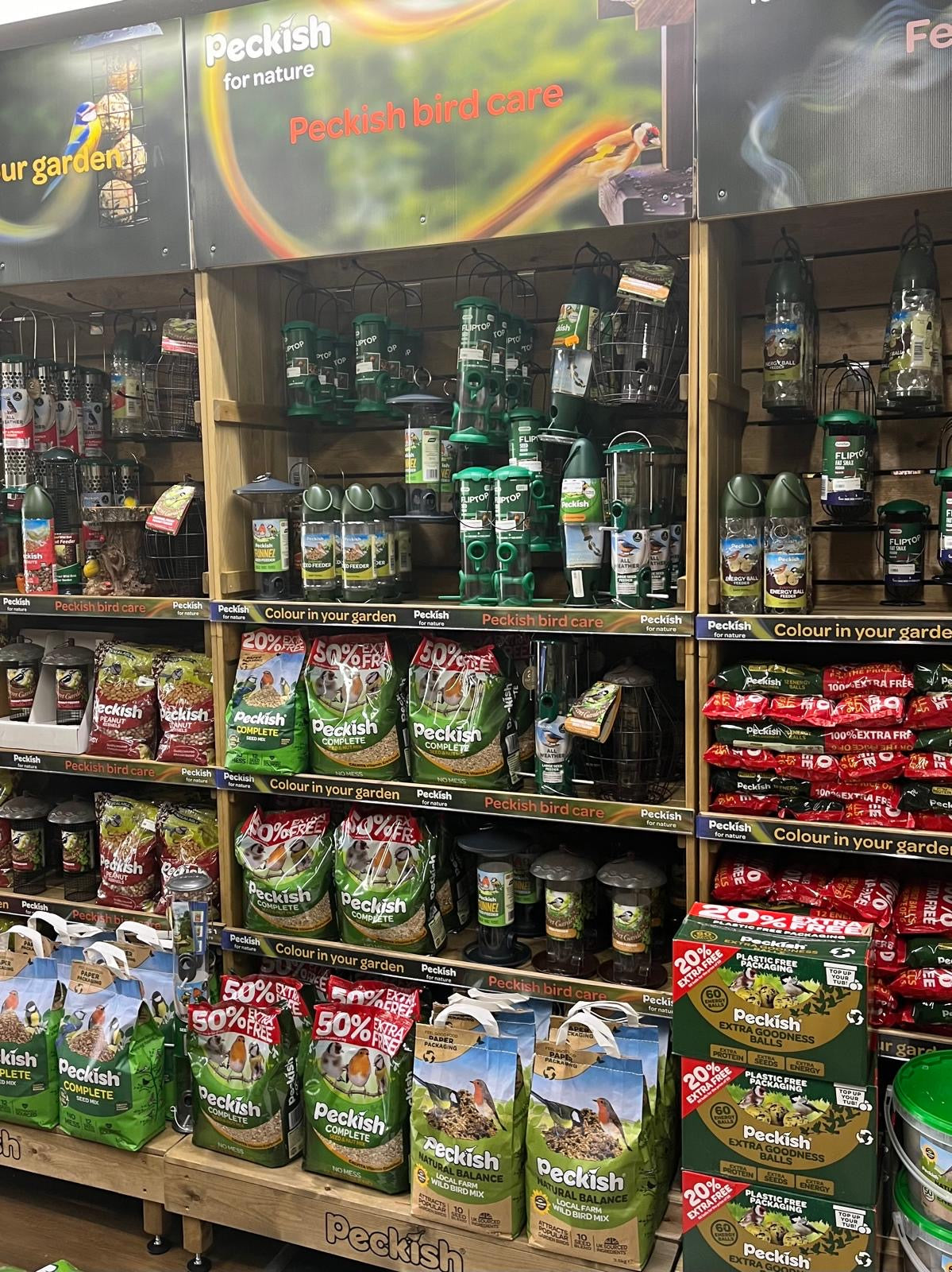 Display of Peckish pet food products in a store